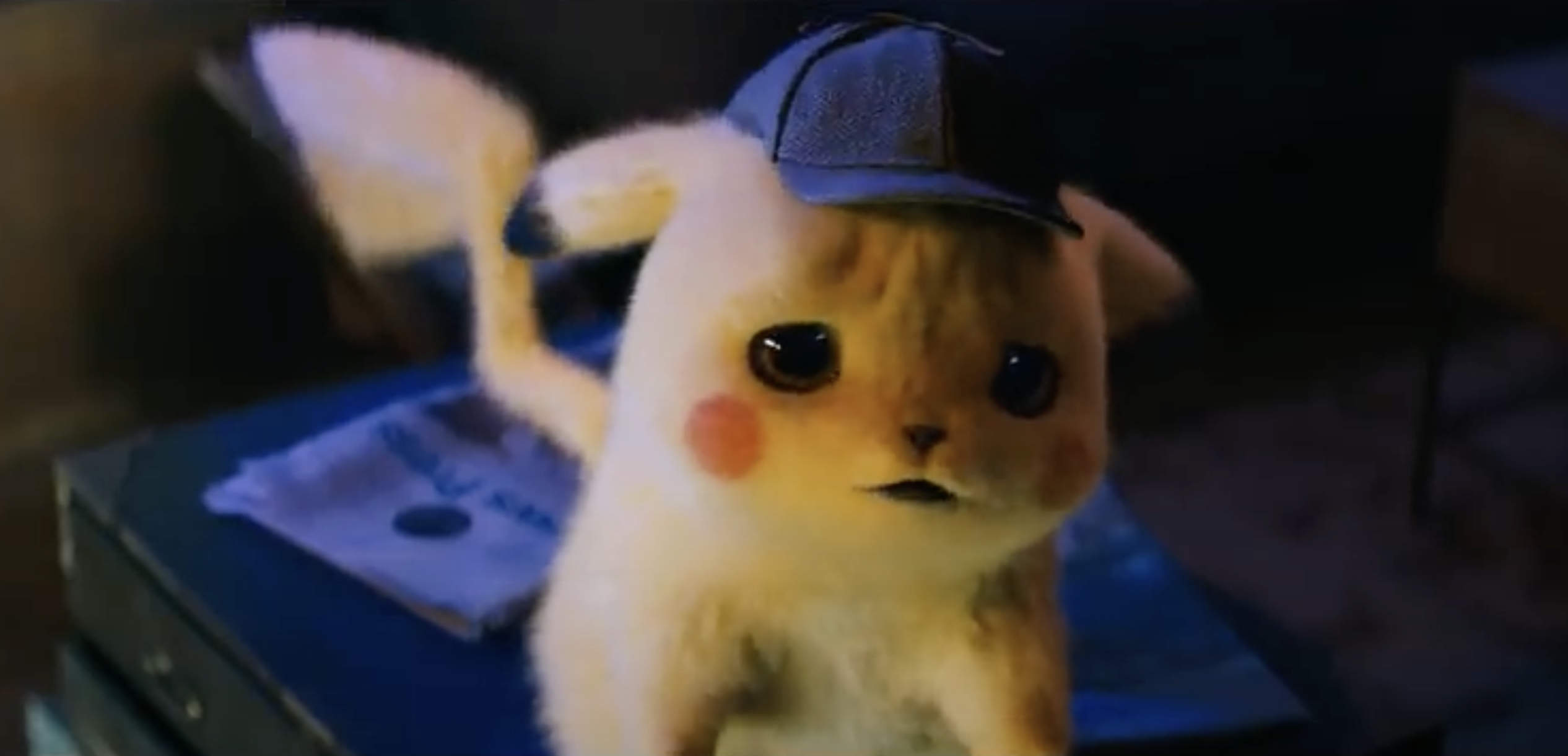 “Pokemon Detective Pikachu” Is Stupid but—Like Ryan Reynolds—Gets by on Its Looks