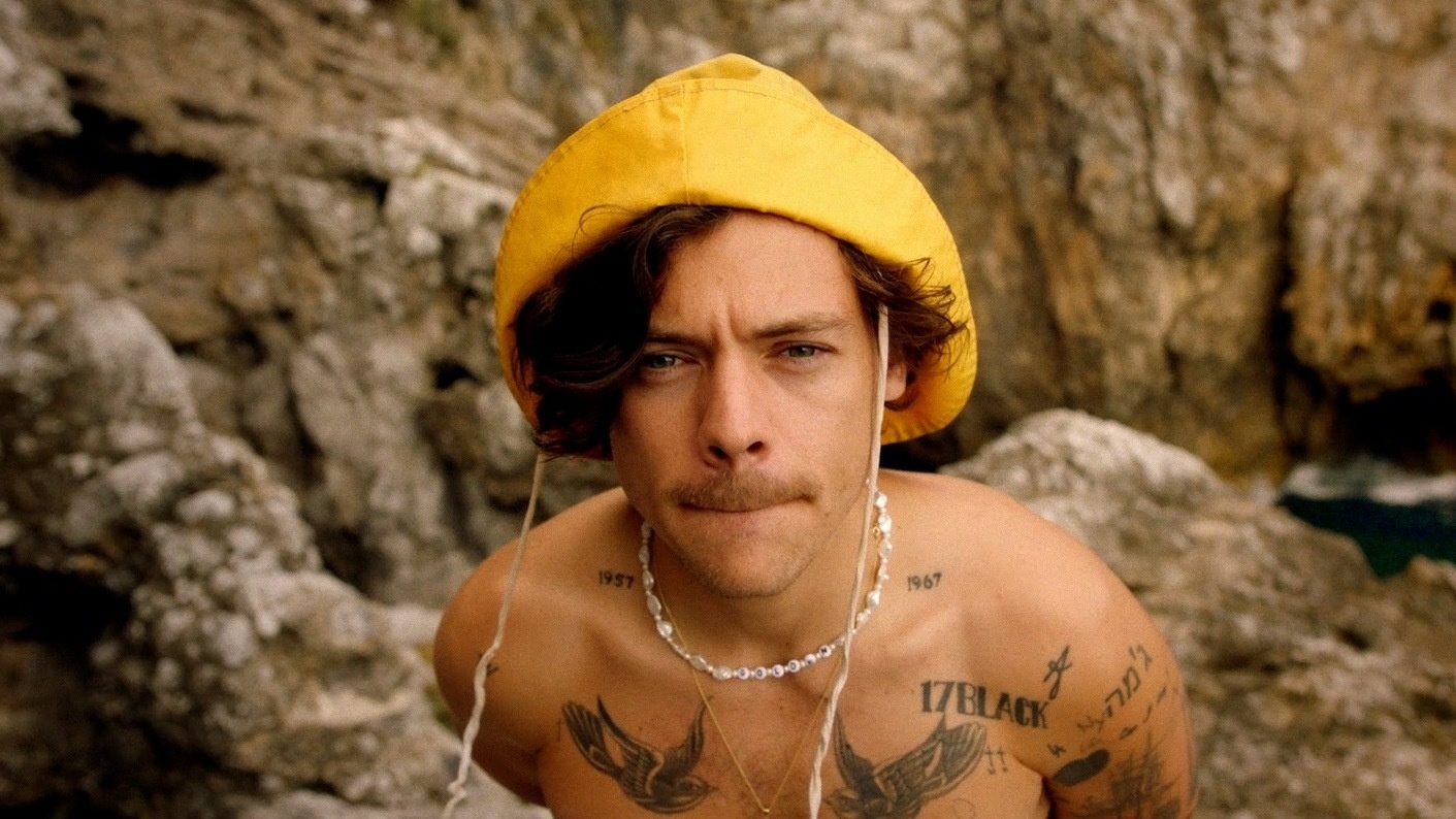 Harry Styles Shows Off More Iconic Outfits in "Golden" Music Video