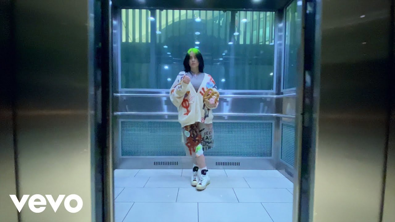 Billie Eilish Flexes While Eating a Mall Pretzel on "Therefore I Am"