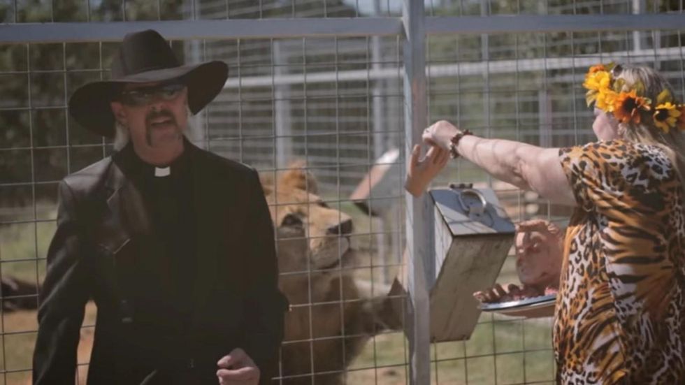 Joe Exotic and a Carole Baskin impersonator in the "Here Kitty Kitty" music video